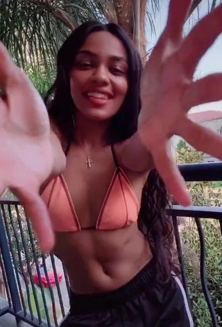 1. Hot China Anne McClain in Peach Bikini Top on the Balcony