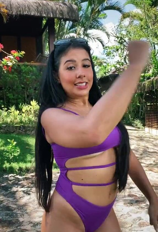 3. Hot Cinthia Cruz in Violet Swimsuit (Underboob)