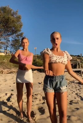 1. Amazing Caitlin Cummins in Hot Pink Crop Top at the Beach