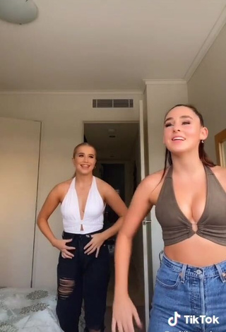 Cute Caitlin Cummins Shows Cleavage in Olive Crop Top