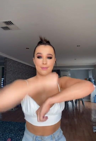 3. Hot Caitlin Cummins Shows Cleavage in White Crop Top