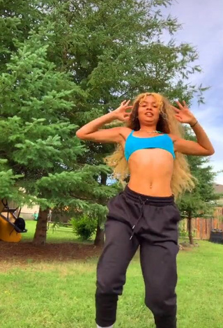 Seductive Cassidy J in Turquoise Crop Top