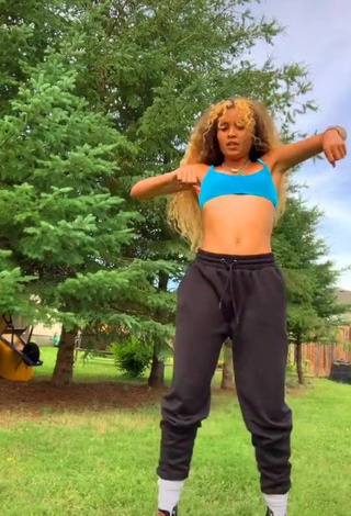 3. Seductive Cassidy J in Turquoise Crop Top