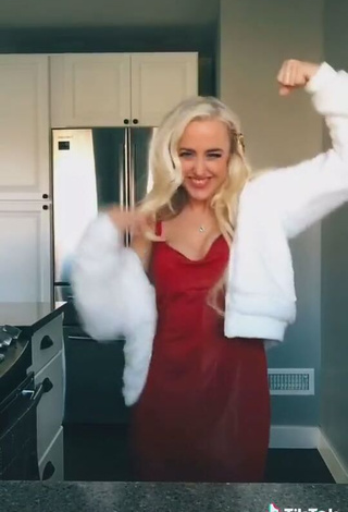 4. Sexy Chani Natasha Davis Shows Cleavage in Red Dress