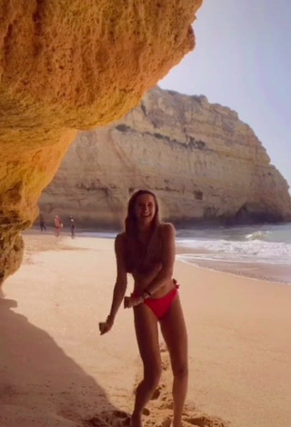 1. Sexy Constanza Ariza in Red Bikini at the Beach