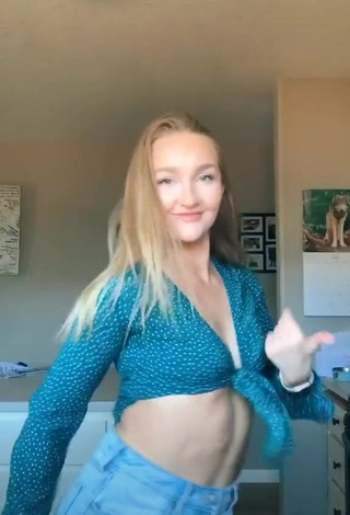 Desirable Bailey McManus Shows Cleavage in Turquoise Crop Top