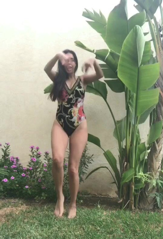 1. Hot Danielle Haden in Floral Swimsuit