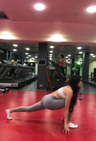 1. Hot Danielle Haden in Grey Leggings while doing Fitness Exercises