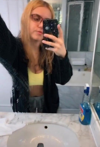 Hot Ella Far Shows Cleavage in Crop Top