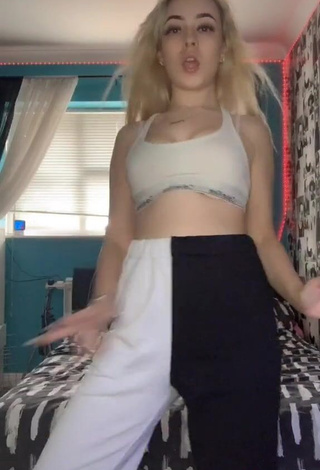 4. Hot Emily Gunn Shows Cleavage in White Crop Top