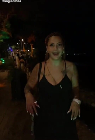 Hot ingizem34 Shows Cleavage in Black Dress in a Street