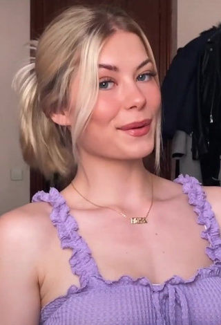 1. Hot Iryna Zubkova Shows Cleavage in Violet Dress