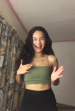 Hot Isabel Luche Shows Cleavage in Olive Crop Top