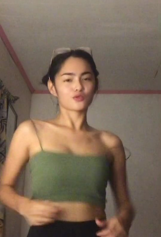 4. Cute Isabel Luche Shows Cleavage in Olive Crop Top