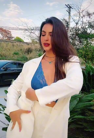 Hot Isa Pinheiro Shows Cleavage in Blue Bra in a Street