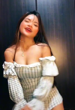 4. Hot Angela Mae Evangelista Shows Cleavage in Checkered Dress