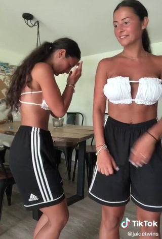 Erotic jakictwins Shows Cleavage in White Bikini Top (Side Boob)