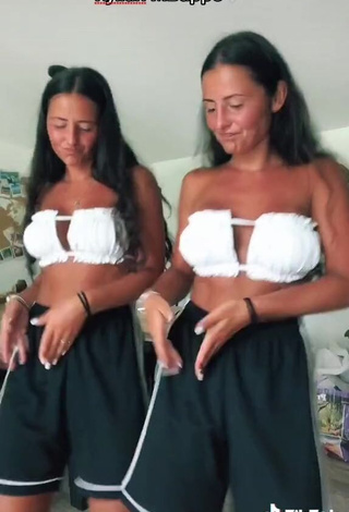 4. Sexy jakictwins Shows Cleavage in White Bikini Top (Side Boob)