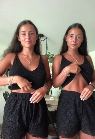 3. Really Cute jakictwins Shows Cleavage in Black Crop Top