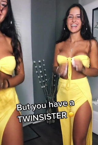 4. Desirable jakictwins Shows Cleavage in Yellow Tube Top (Underboob)