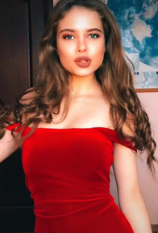 1. Hot Katrine Shows Cleavage in Red Dress