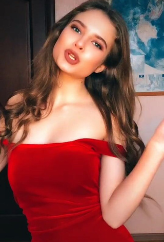 Hot Katrine Shows Cleavage in Red Dress