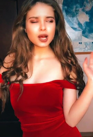 4. Hot Katrine Shows Cleavage in Red Dress