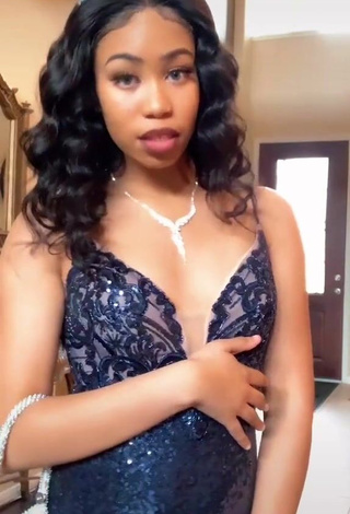 3. Sexy Amya Tolbert Shows Cleavage in Dress (Side Boob)