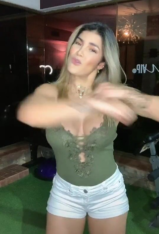 3. Hot Laura Fuentes Shows Cleavage in Olive Top (Side Boob)