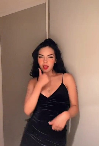 3. Beautiful Lili Sixx Shows Cleavage in Sexy Black Dress