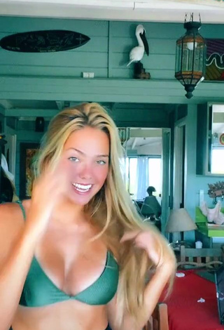 3. Desirable Maeva Reichert Shows Cleavage in Green Bikini Top