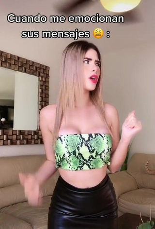 1. Hot Mafer Payan Shows Cleavage in Snake Print Tube Top