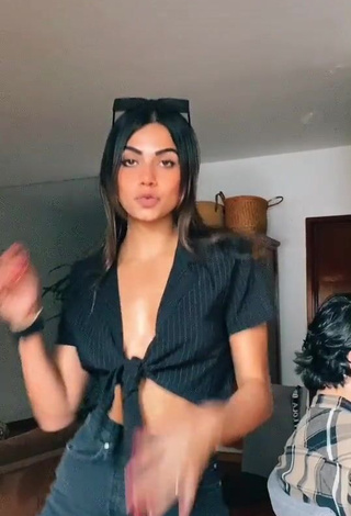 1. Cute Manu Barrios Shows Cleavage in Black Crop Top (Side Boob)