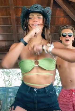 3. Hot Manu Barrios Shows Cleavage in Green Bikini Top