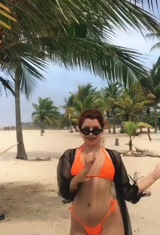 4. Hot Marian in Orange Bikini at the Beach