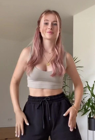 1. Alluring Marie-Sophie Shows Cleavage in Erotic Grey Crop Top