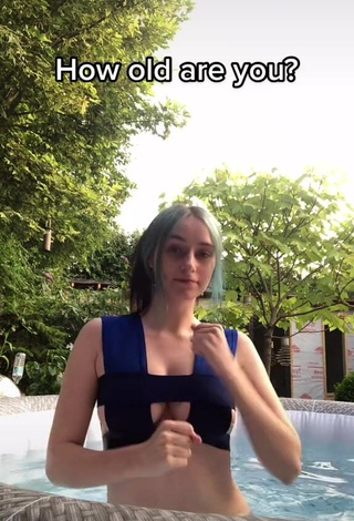 Sexy Georgie Rubery Shows Cleavage in Blue Crop Top at the Pool