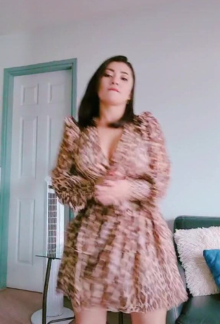 1. Seductive Milagro Flores Shows Cleavage in Leopard Dress and Bouncing Breasts