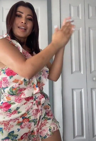 3. Sexy Milagro Flores Shows Cleavage in Floral Overall