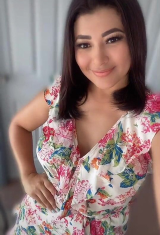 1. Hot Milagro Flores in Floral Overall