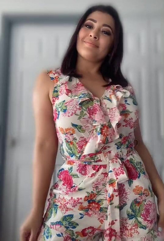 4. Hot Milagro Flores in Floral Overall