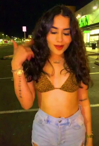 Sexy Iya Madrid Shows Cleavage in Leopard Bikini Top