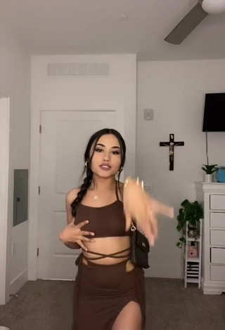 Desirable Iya Madrid Shows Cleavage in Brown Crop Top