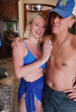 3. Hot Mollee Gray Shows Cleavage in Blue Bikini Top