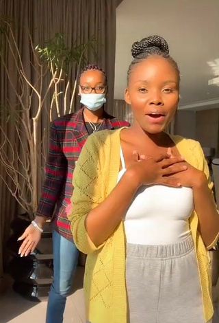 1. Sexy mpho pink Shows Cleavage in White Top