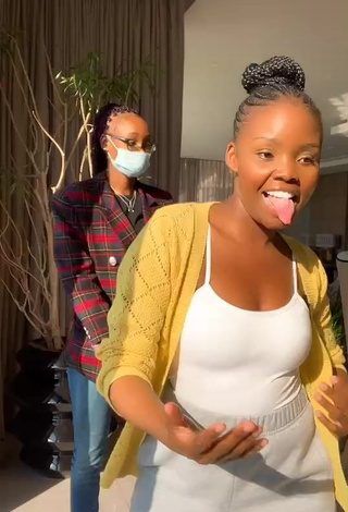 4. Sexy mpho pink Shows Cleavage in White Top