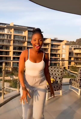 Hot mpho pink Shows Cleavage in White Top