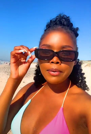 1. Hot mpho pink Shows Cleavage in Bikini Top at the Beach