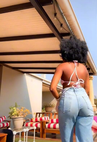 1. Sexy mpho pink Shows Cleavage in White Bikini Top