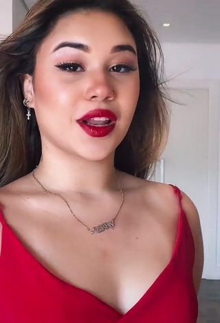 Hot Nica Reina Shows Cleavage in Red Dress